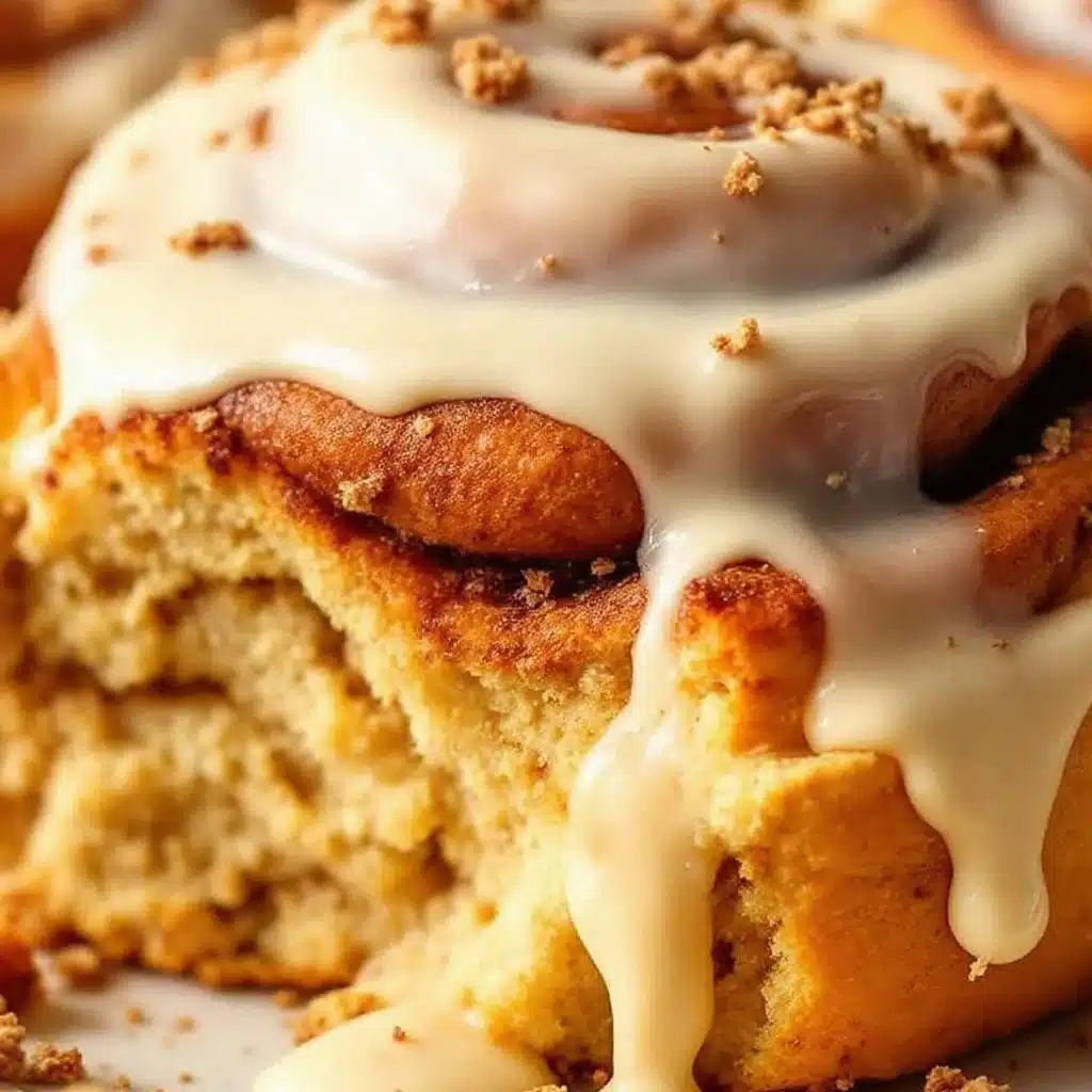 fluffy pumpkin cinnamon rolls with maple icing - featured image